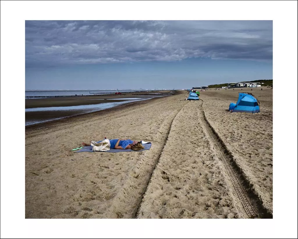 Lady in blue on beach